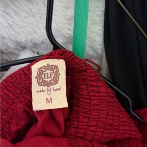 ELF wine red smocked blouse